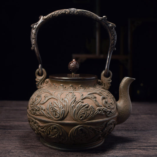 Classical old iron kettle for making tea